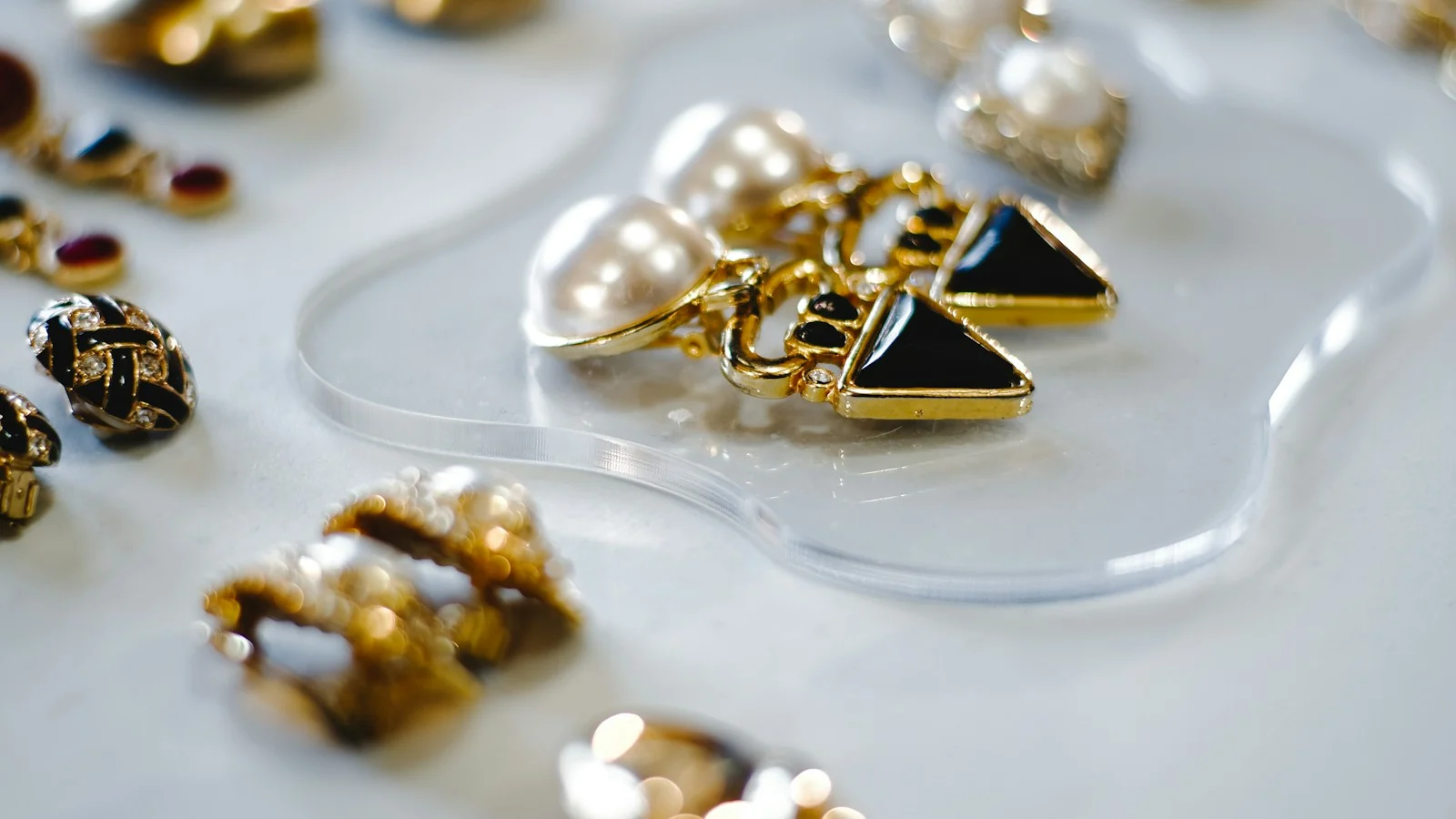 Vintage pearl earrings on a flea market table