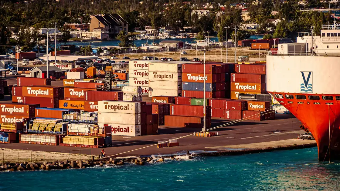 Cargo containers waiting to be loaded at a harbour