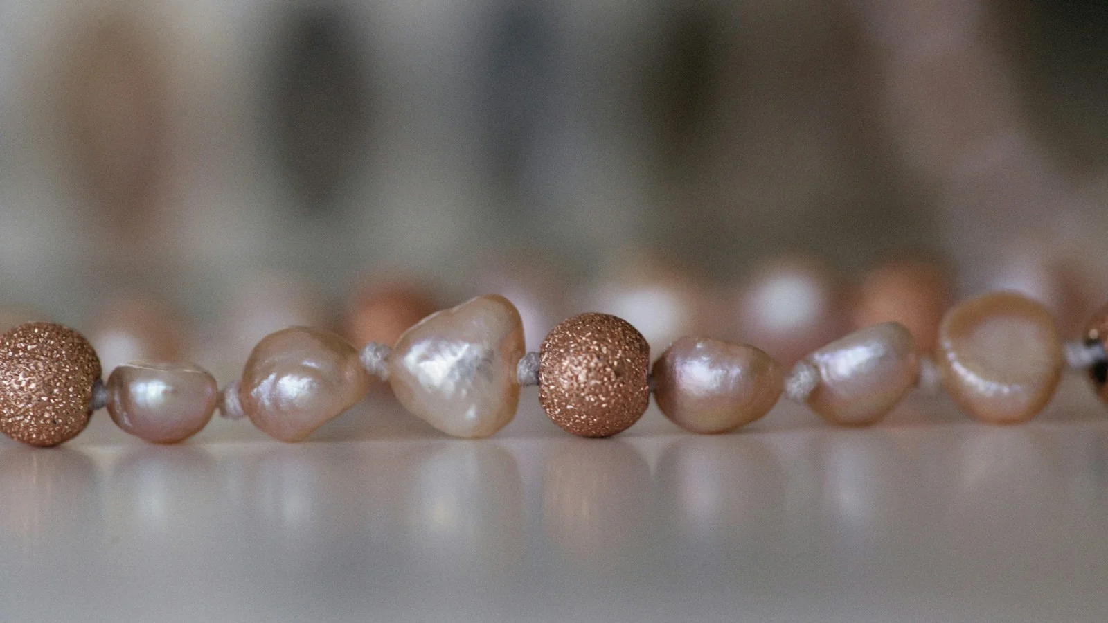 Lustrous baroque pearls strung in a row
